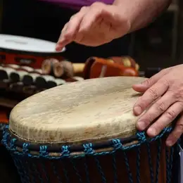 playing djembe drums